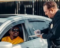 man filing a police report after collision