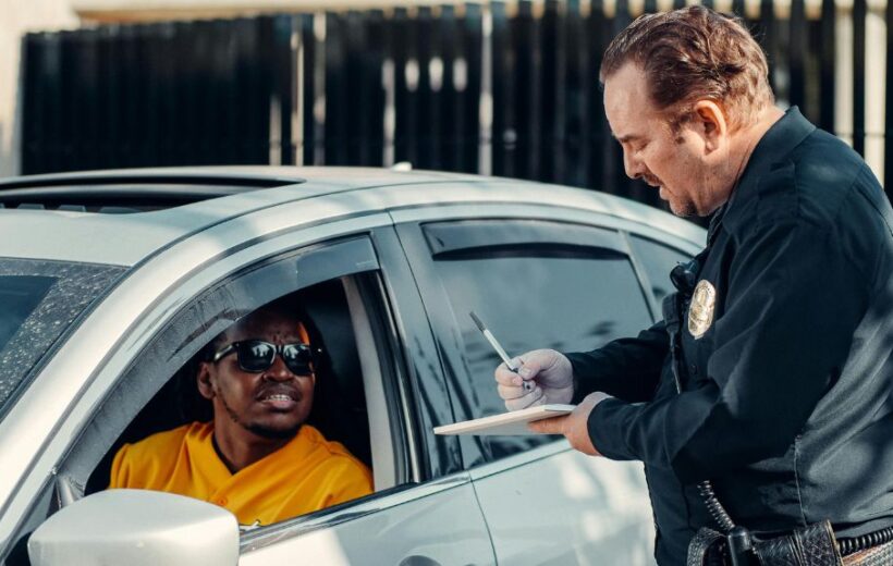 man filing a police report after collision